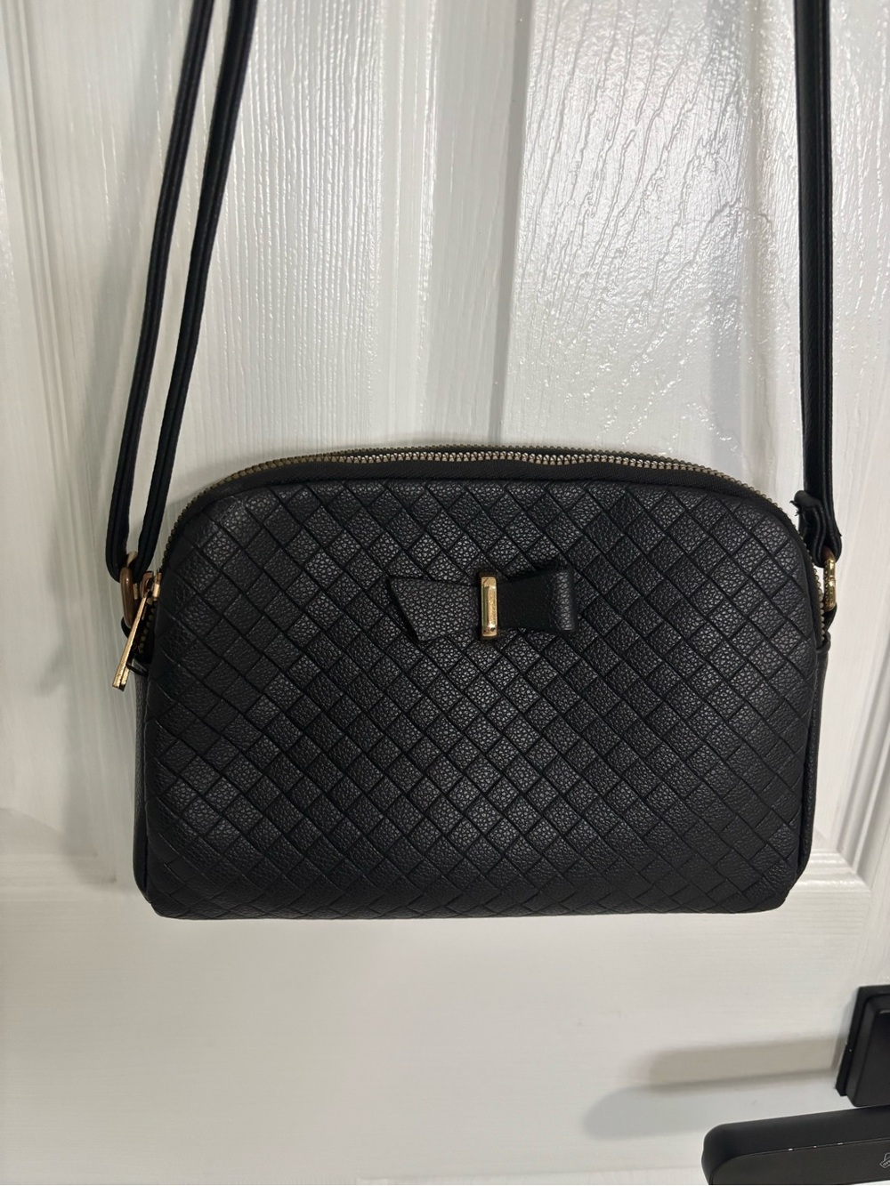 Black Quilted Crossbody Bag with Bow Accent